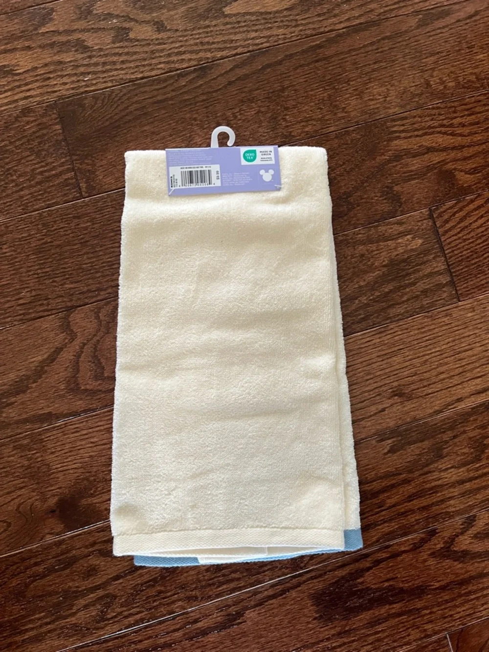 Disney cream hand towel with pastel accents